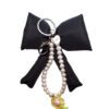 Large black bow with pearl & charm drop