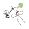 Keychain with pearl bow and heart mirror charm