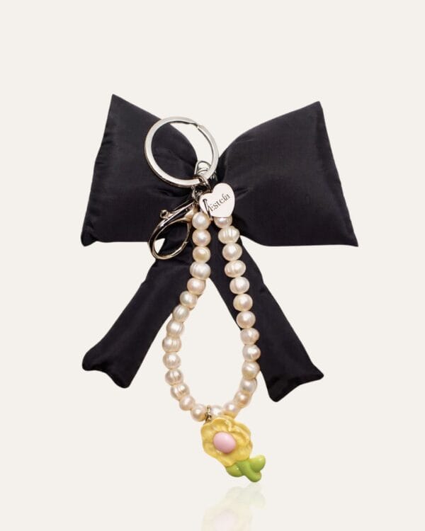 Large black bow with pearl & charm drop