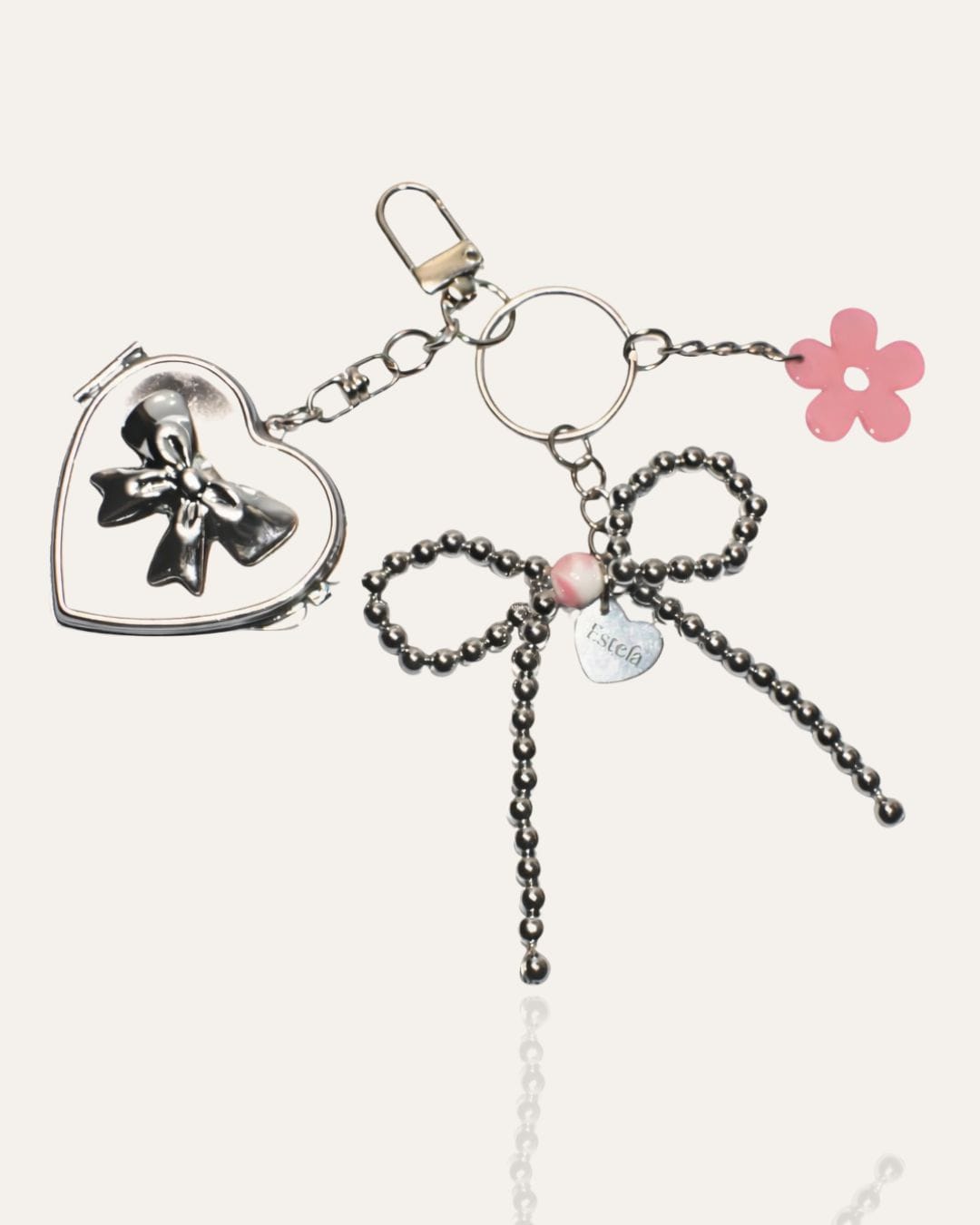 Keychain with white gold bow and heart mirror charm