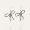 Earrings with white gold bows