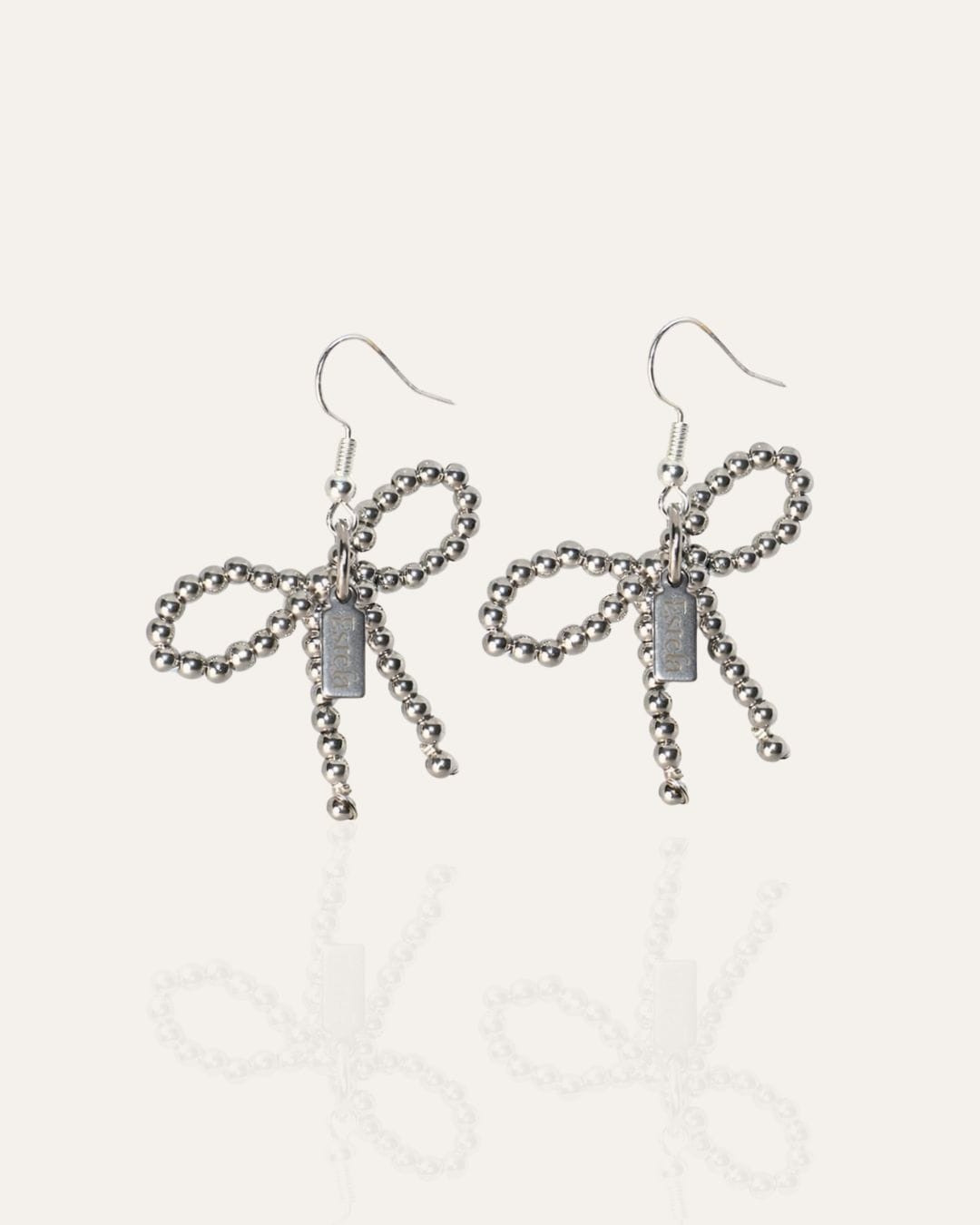 116 Earrings with white gold bows