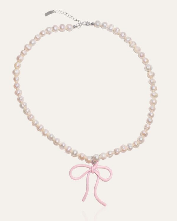 Pearl necklace with pink bow charm