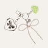 Keychain with pearl bow and heart mirror charm