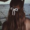 Hair clip with pearl bow