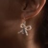 Earrings with pearl bows