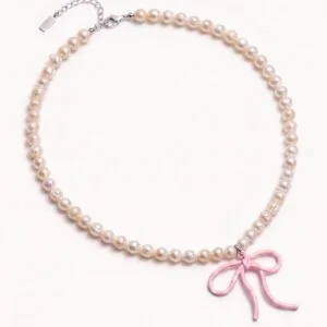 Pearl necklace with pink bow charm