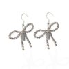 Earrings with white gold bows