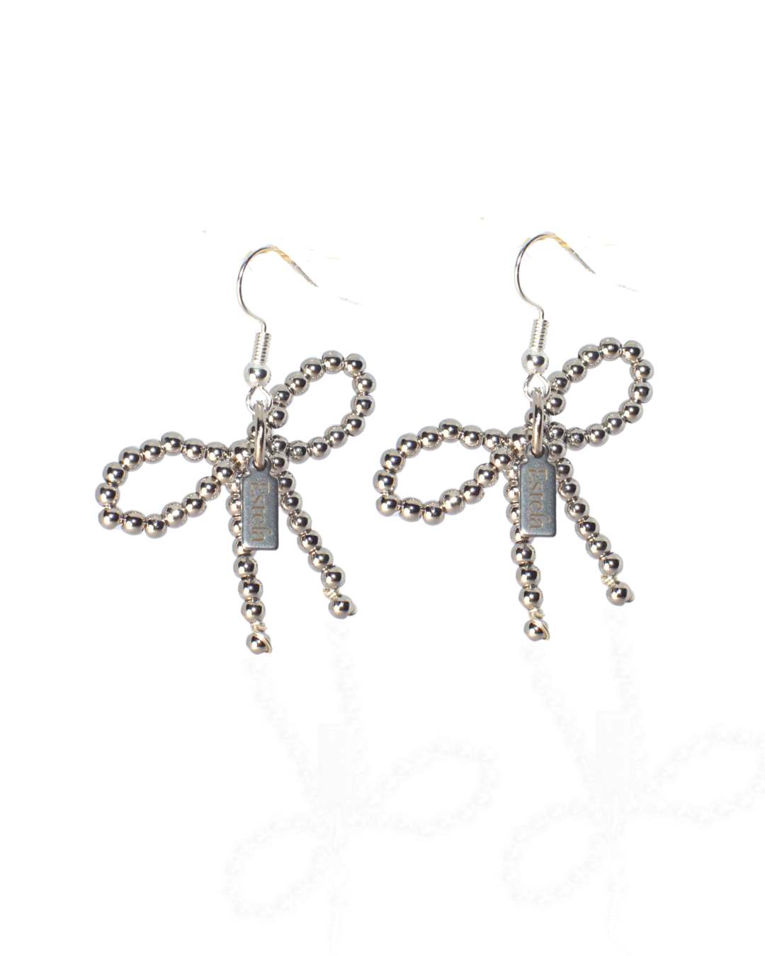 Earrings with white gold bows