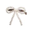 Hair clip with pearl bow