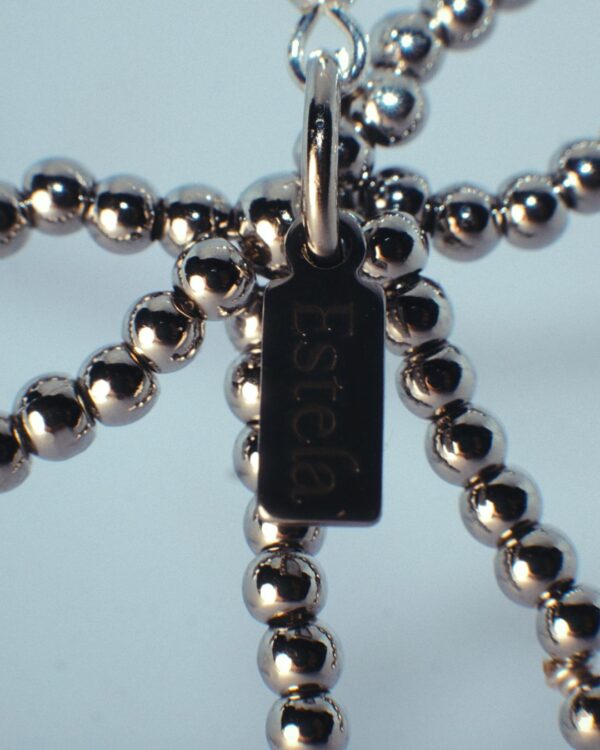 Earrings with white gold bows