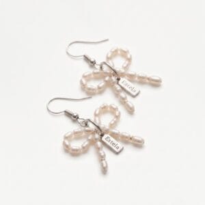 Earrings with pearl bows