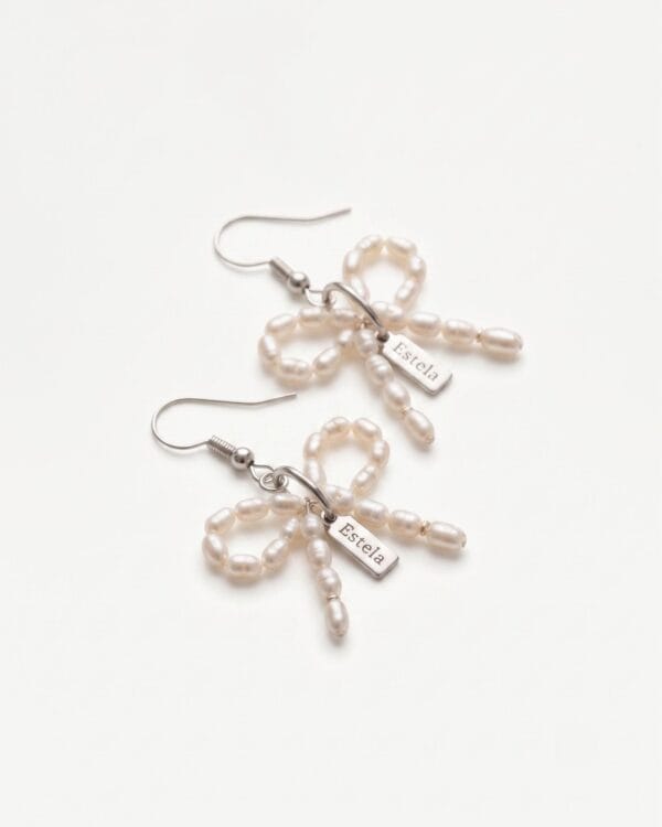 Earrings with pearl bows