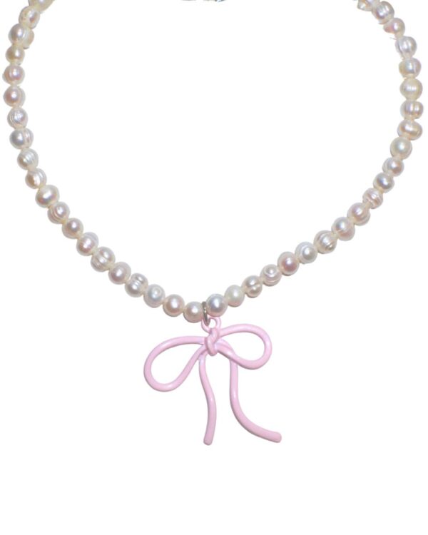 Pearl necklace with pink bow charm