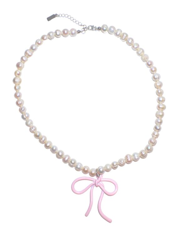 Pearl necklace with pink bow charm