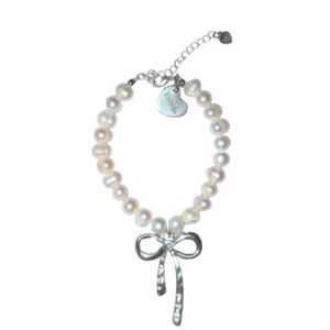 Pearl bracelet with silver bow charm
